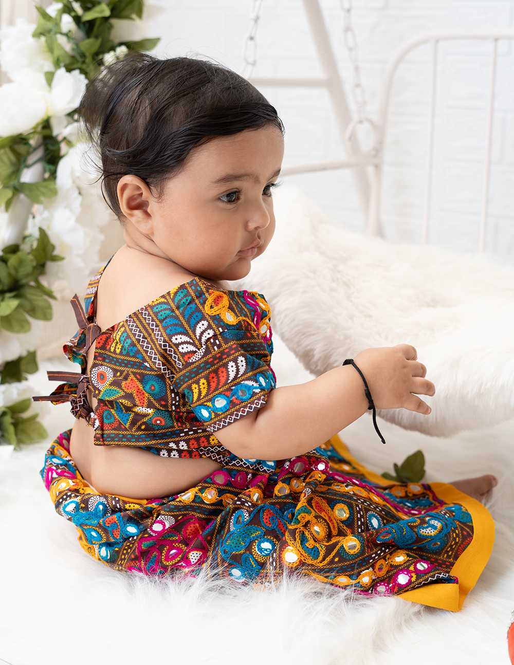 Baby milestone portrait in studio set